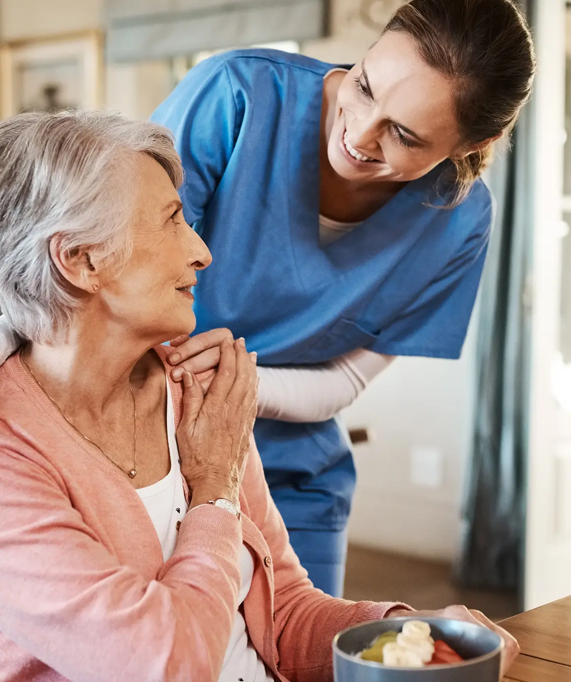 Healthcare, elderly woman with nurse with breakfast at her home healthcare, elderly woman with nurse with breakfast at her home